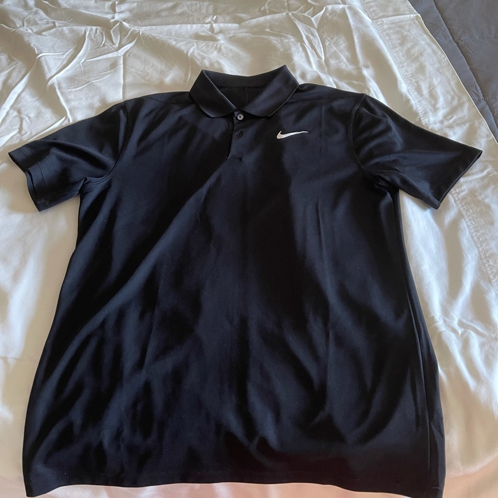 Nike DRI-FIT polo in black.  GUC, looks new still